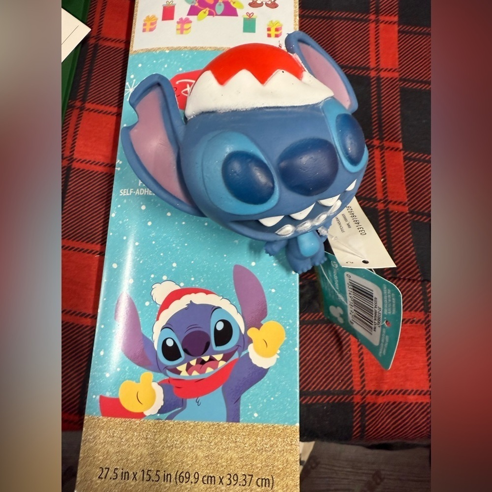 Disney Christmas Stitch Stress Toy and Holiday Window Clling Ons.